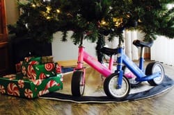 TootScoot balance bikes under a Christmas tree. 